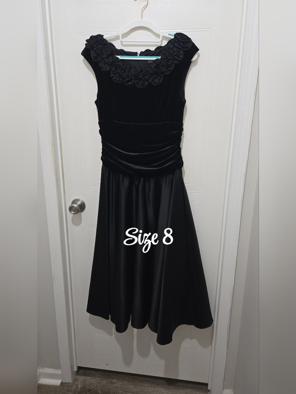 Elegant Black Cocktail Dress with Rosette Neckline